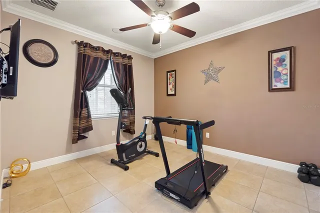a bed room with a bed and a chandelier