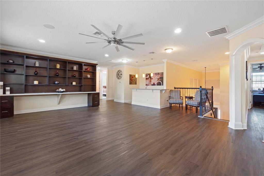 1445 Via Sangro Place Winter Park, FL 32792 - Photo 29 of 58 a view of a big room with wooden floor and windows