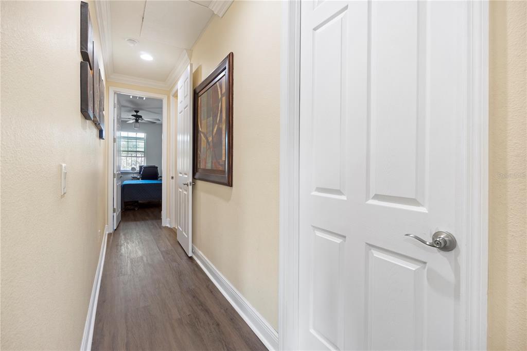 1445 Via Sangro Place Winter Park, FL 32792 - Photo 35 of 58 a view of a hallway with wooden floor