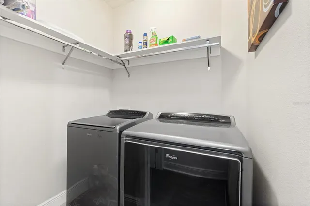 a bedroom with a bed and a closet