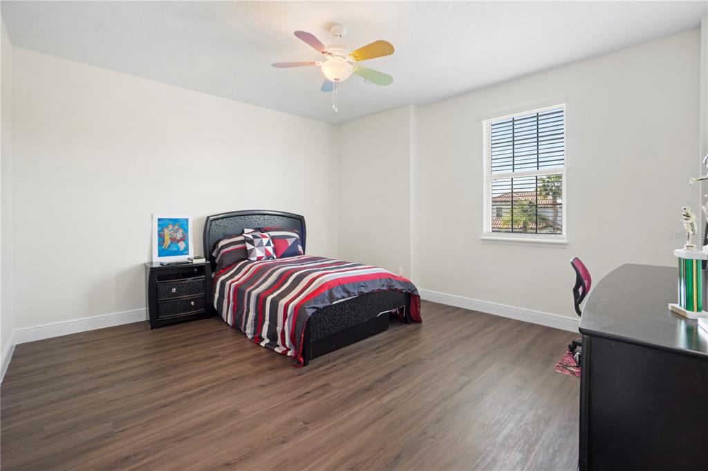 1445 Via Sangro Place Winter Park, FL 32792 - Photo 40 of 58 a bedroom with a bed and a closet