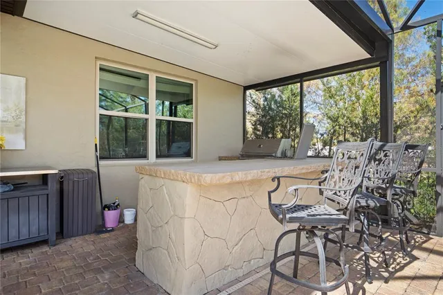 a kitchen with a sink and a stove