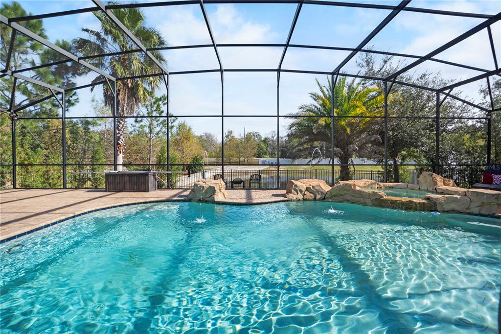 1445 Via Sangro Place Winter Park, FL 32792 - Photo 47 of 58 a view of a garden with a bench