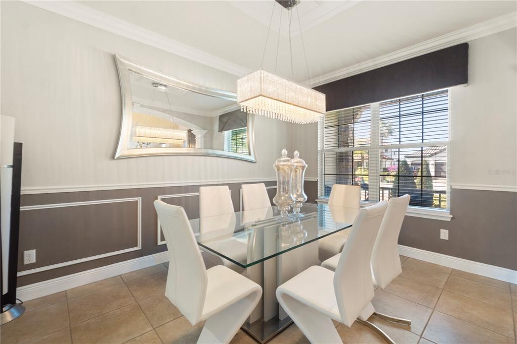 1445 Via Sangro Place Winter Park, FL 32792 - Photo 6 of 58 a dining room with furniture and window