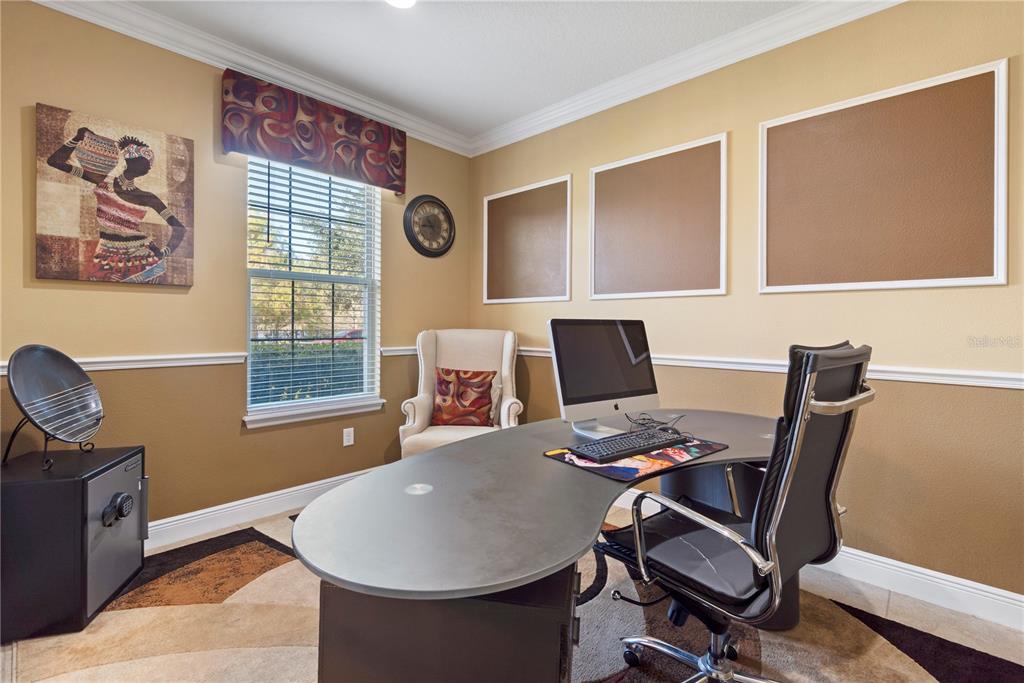 1445 Via Sangro Place Winter Park, FL 32792 - Photo 8 of 58 a workspace with furniture and window