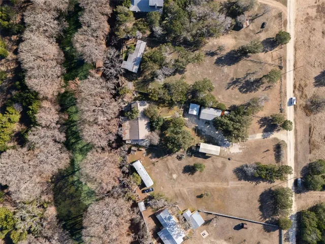 an aerial view of residential house with outdoor space