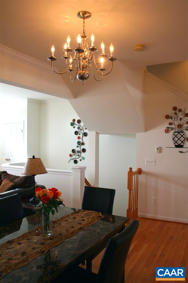 323 Rolkin Road Charlottesville, VA 22911 - Photo 13 of 47 a view of a room with furniture and chandelier