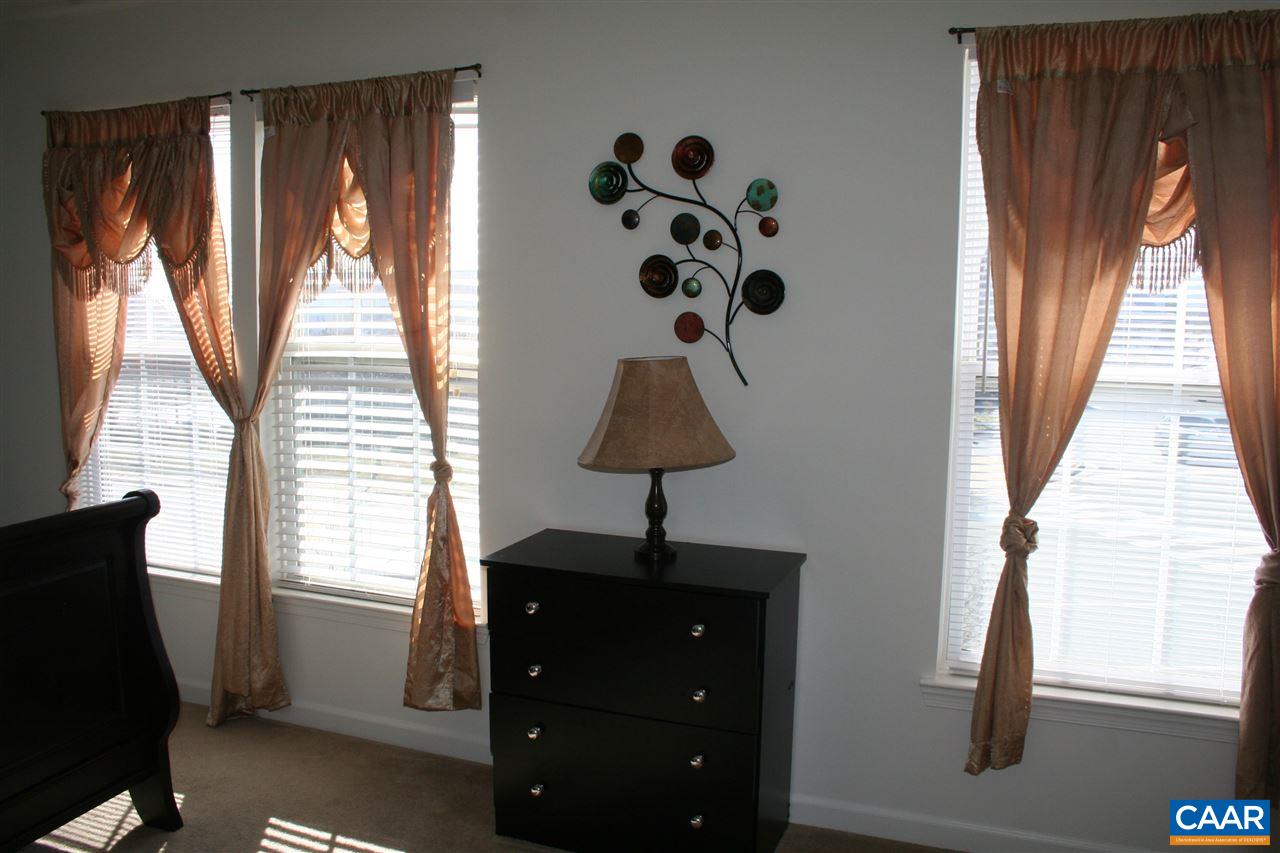 323 Rolkin Road Charlottesville, VA 22911 - Photo 20 of 47 a room with a window and a table