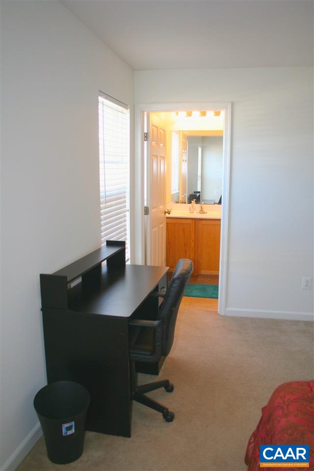 323 Rolkin Road Charlottesville, VA 22911 - Photo 27 of 47 a workspace with furniture and window