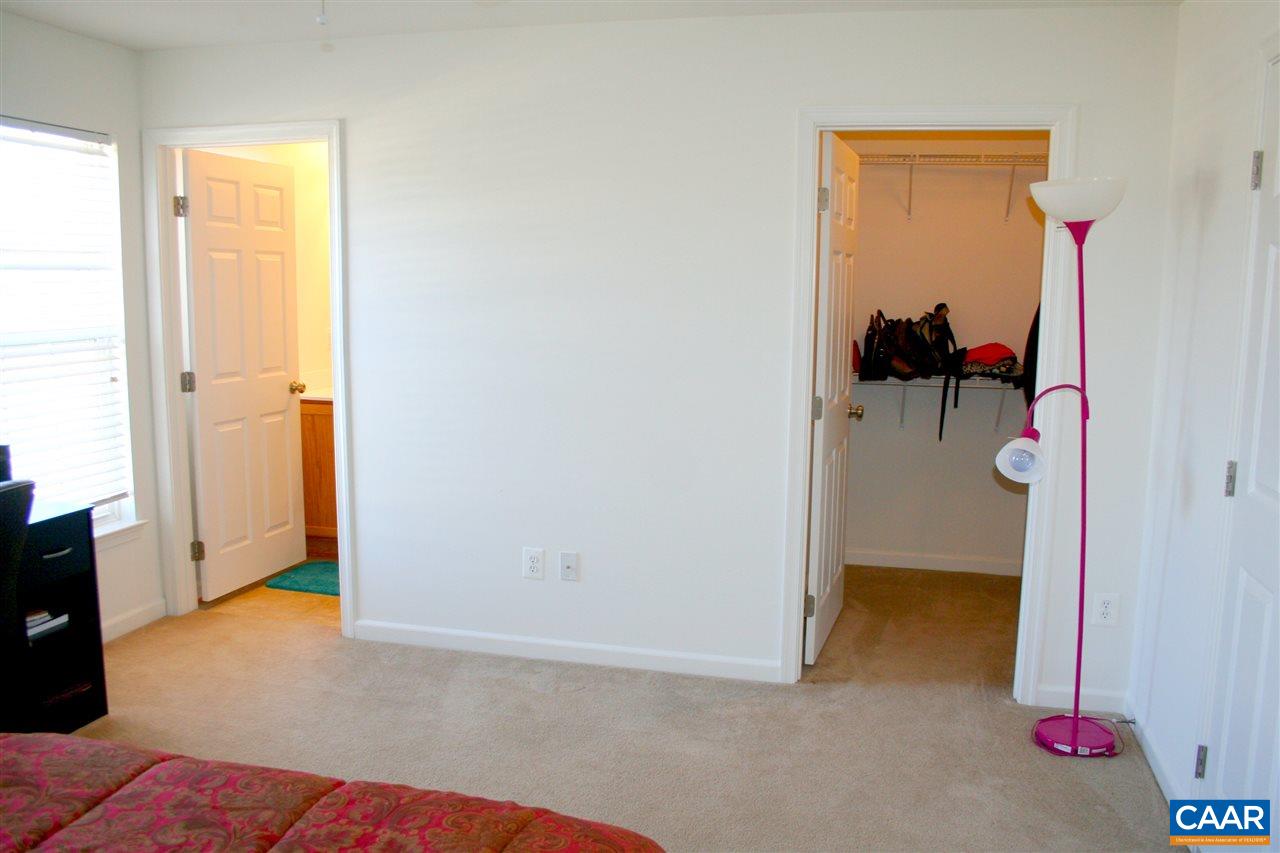 323 Rolkin Road Charlottesville, VA 22911 - Photo 29 of 47 a view of walk in closet with clothes and shoes