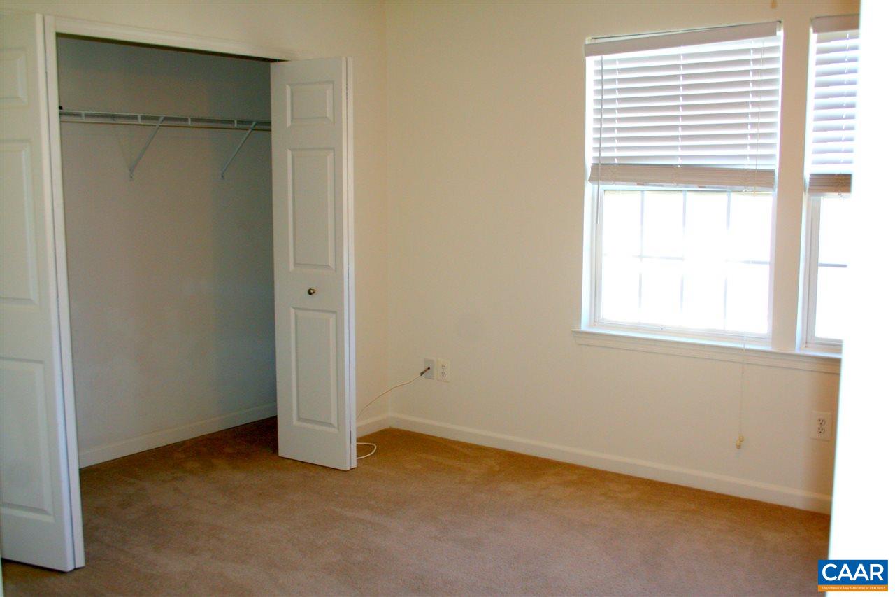 323 Rolkin Road Charlottesville, VA 22911 - Photo 33 of 47 a view of an empty room with a window
