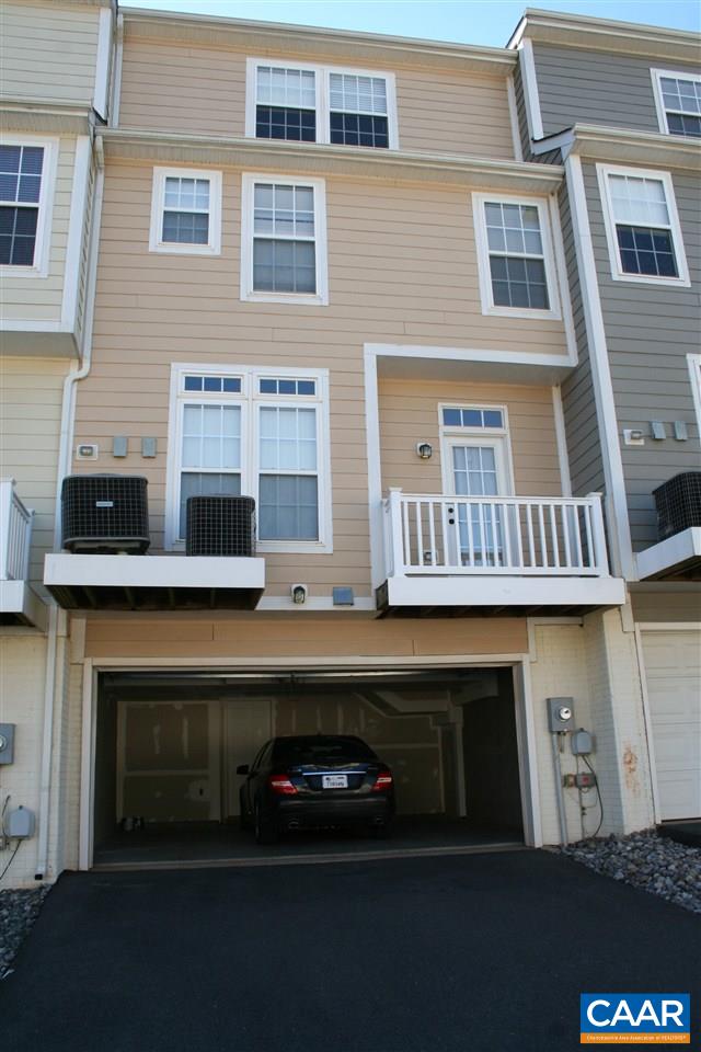323 Rolkin Road Charlottesville, VA 22911 - Photo 41 of 47 a view of building with car parked