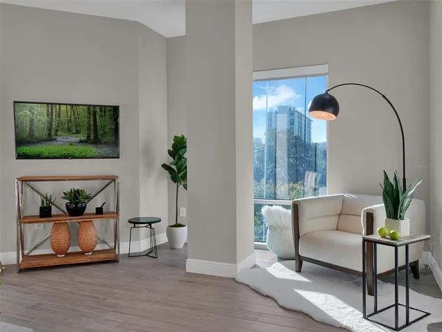 a kitchen with granite countertop a sink stove and cabinets