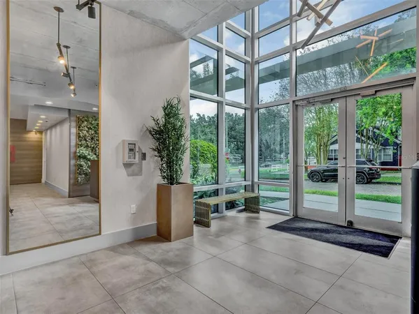 a view of a room with a large window