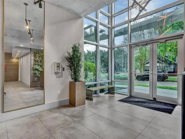 a view of a room with a large window