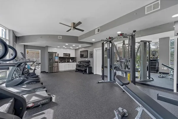 a view of a room with gym equipment