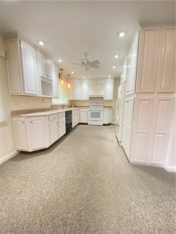 7 Lininger Road Greenville, PA 16125 - Photo 17 of 48 a large white kitchen with a large window