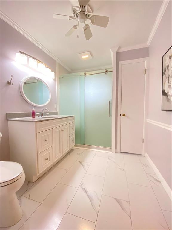 7 Lininger Road Greenville, PA 16125 - Photo 29 of 48 a spacious bathroom with a granite countertop sink a mirror and a toilet