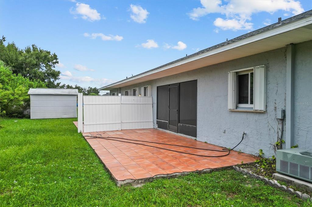 2660 Lear Road Englewood, FL 34224 - Photo 12 of 42 a front view of house with yard