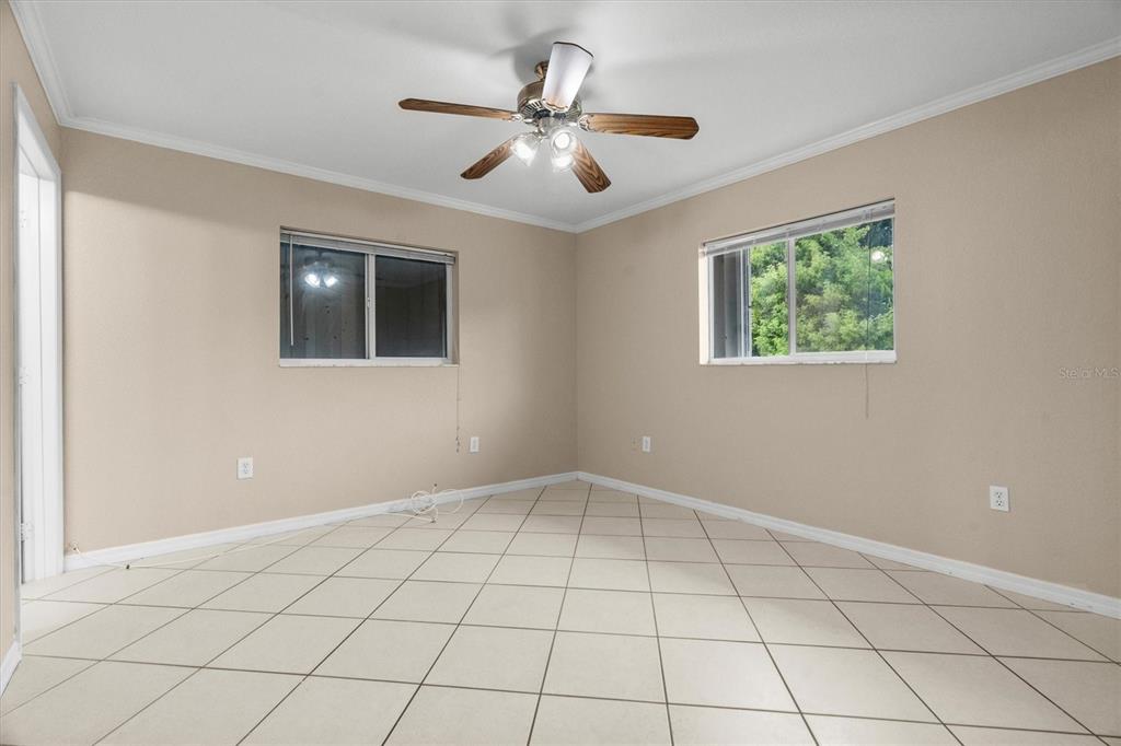 2660 Lear Road Englewood, FL 34224 - Photo 17 of 42 a view of an empty room with a window