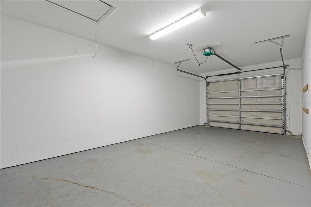 2660 Lear Road Englewood, FL 34224 - Photo 20 of 42 a view of room that has a white walls