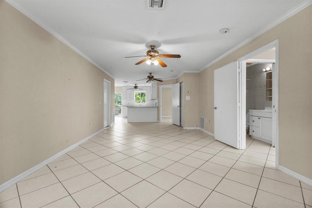 2660 Lear Road Englewood, FL 34224 - Photo 22 of 42 a view of an empty room and a ceiling fan