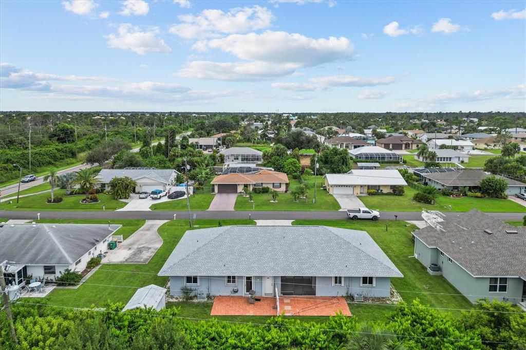 2660 Lear Road Englewood, FL 34224 - Photo 36 of 42 an aerial view of a house with a garden