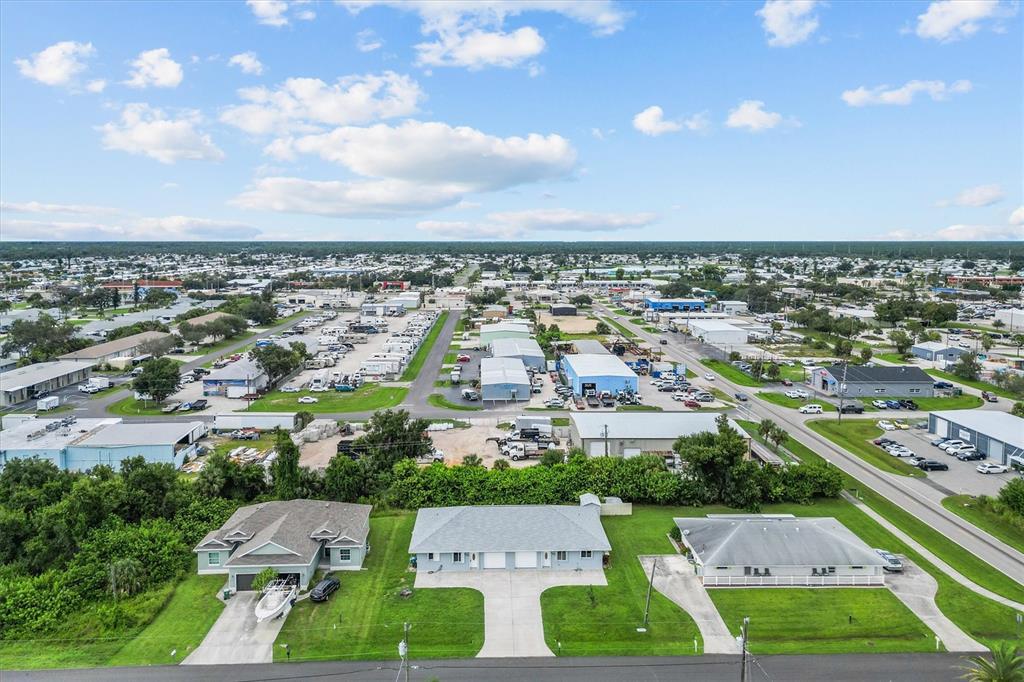 2660 Lear Road Englewood, FL 34224 - Photo 38 of 42 an aerial view of residential houses with outdoor space and street view