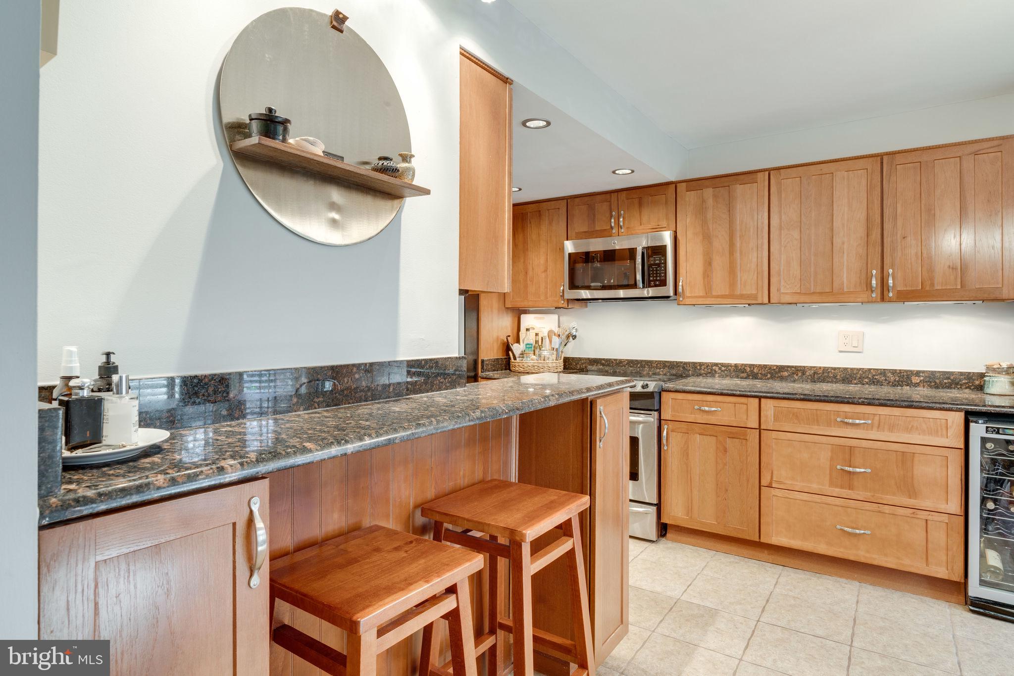 6253 Rathlin Drive Springfield, VA 22152 - Photo 3 of 29 Bar seating in kitchen