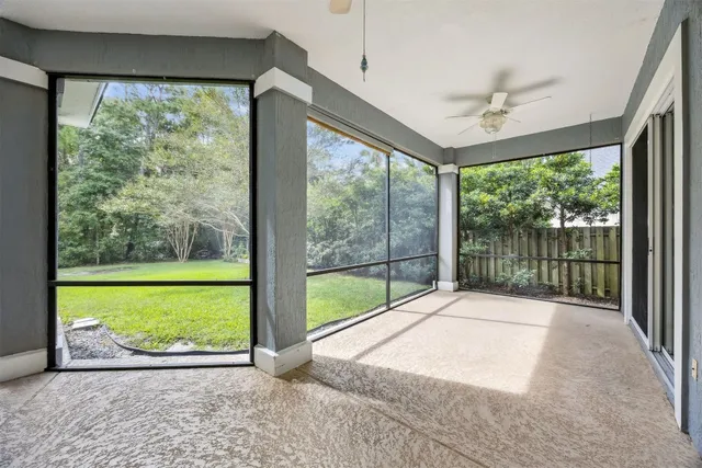 a view of a room with a large window