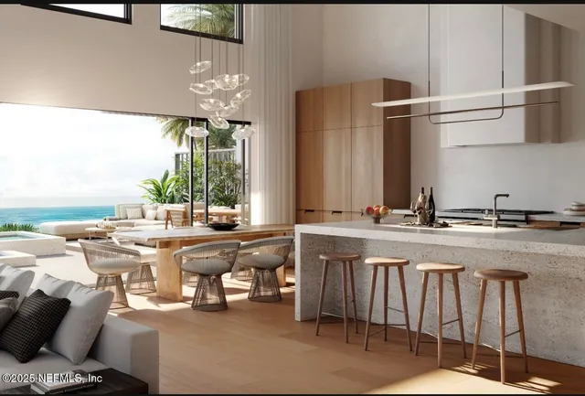 a large kitchen with a table and chairs