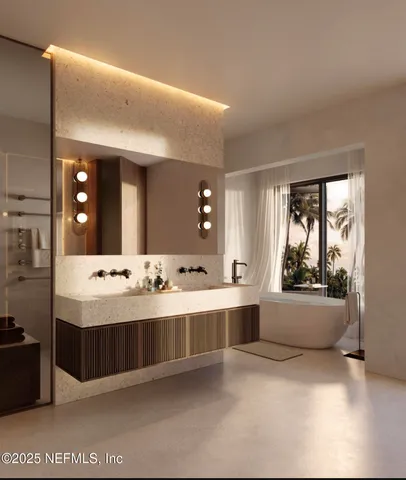 a view of bathroom with bathtub and double vanity