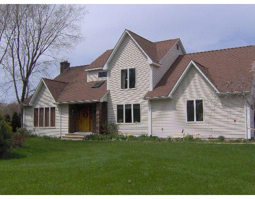 3134 Boston Road Wilbraham, MA 01095 - Photo 1 of 19 a front view of a house with a yard