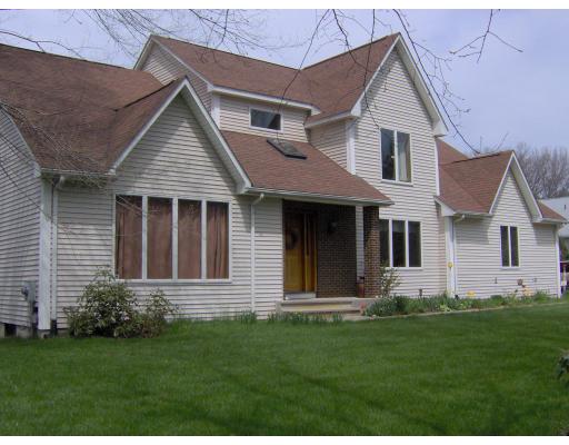 3134 Boston Road Wilbraham, MA 01095 - Photo 18 of 19 a front view of a house with a yard