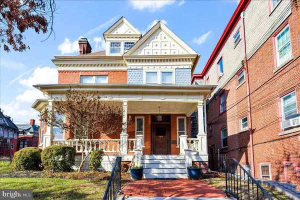 a front view of a house with a ocean view