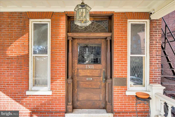 a front view of a house with a glass door