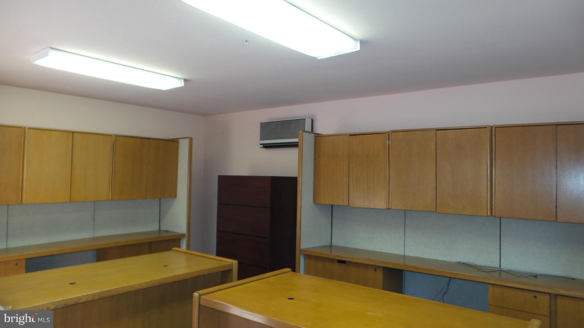 13409 Bladon Road Phoenix, MD 21131 - Photo 22 of 27 a room with a bed and cabinets