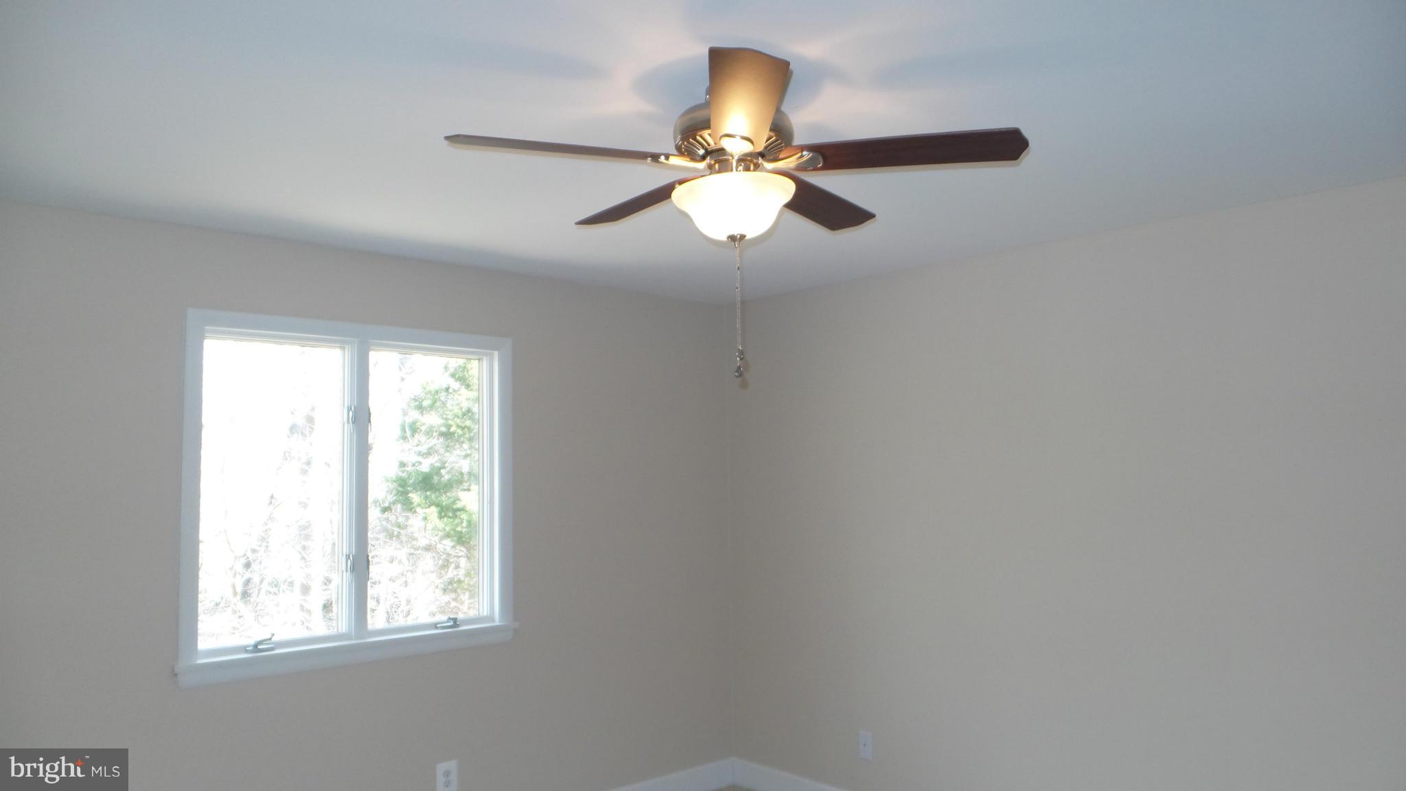 13409 Bladon Road Phoenix, MD 21131 - Photo 8 of 27 a light that has a window in it
