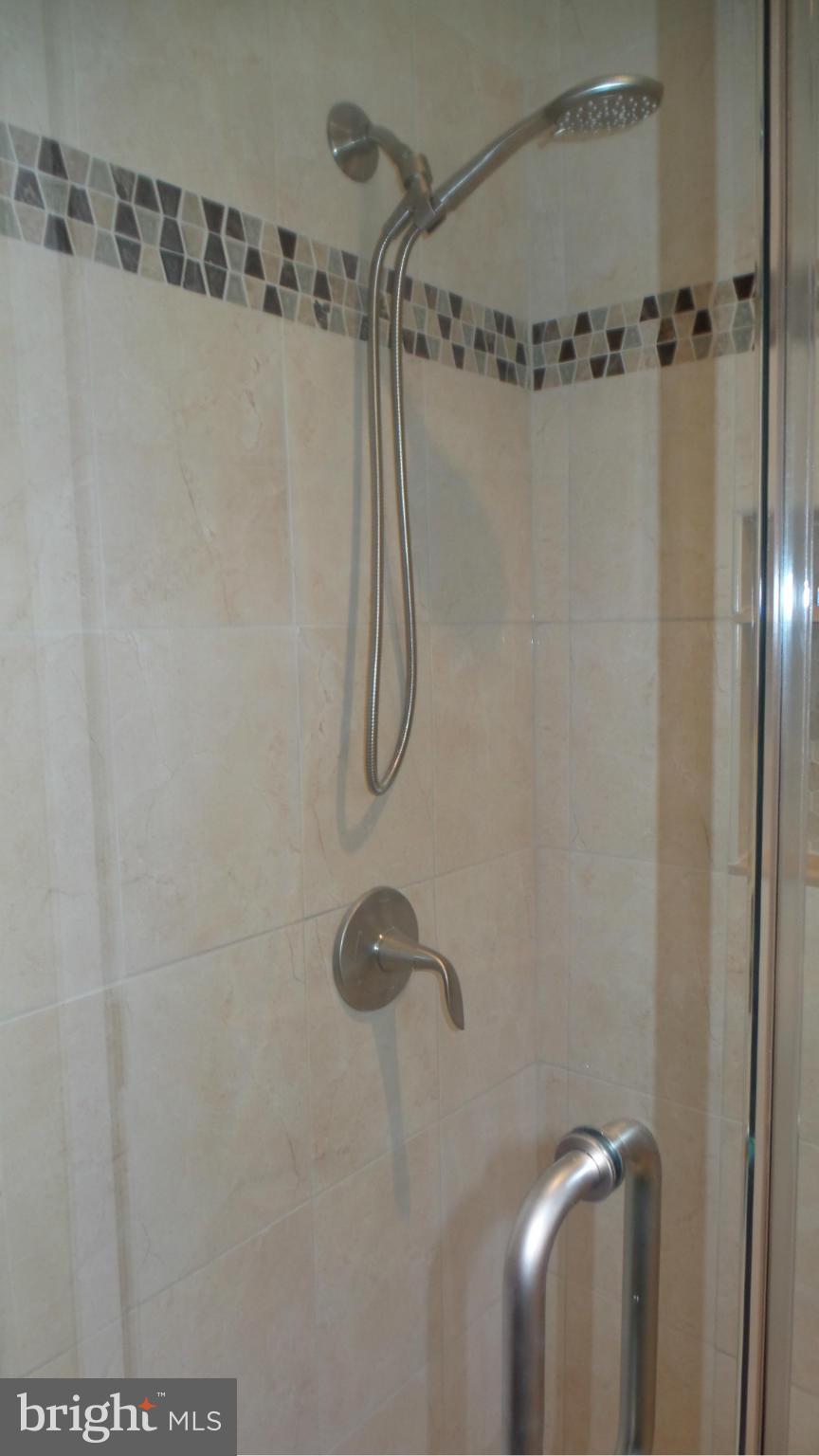 13409 Bladon Road Phoenix, MD 21131 - Photo 10 of 27 a bathroom with a shower