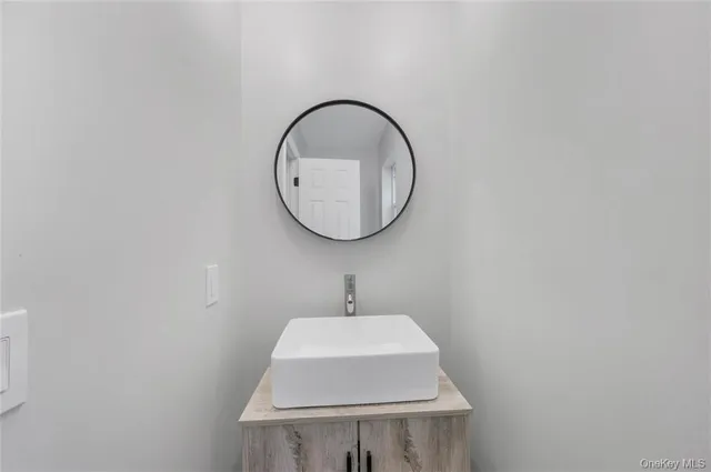 a sink with a mirror