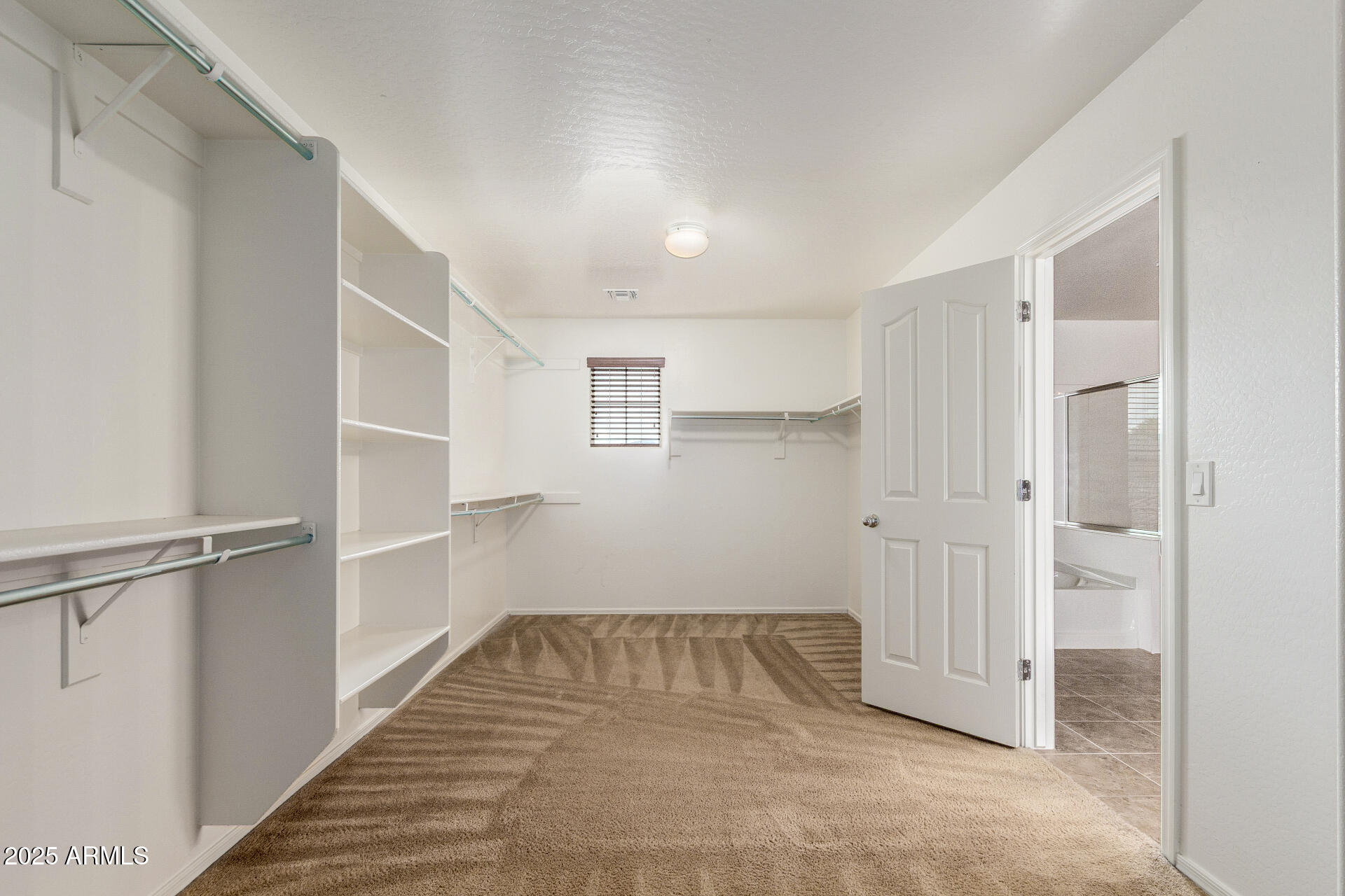 20932 Vía De Arboles Queen Creek, AZ 85142 - Photo 30 of 58 a view of entryway with white walls