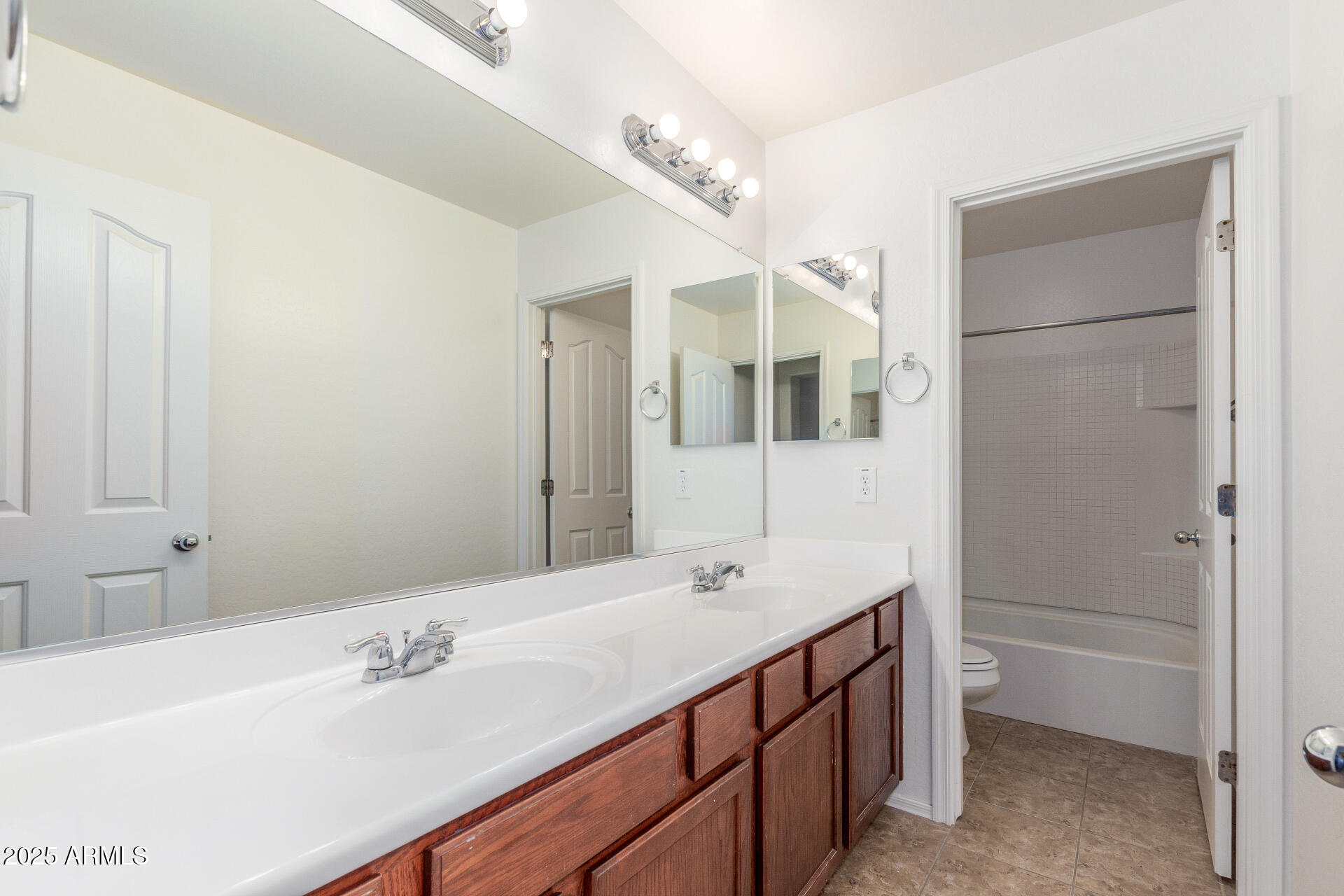 20932 Vía De Arboles Queen Creek, AZ 85142 - Photo 41 of 58 a spacious bathroom with a tub sink and mirror