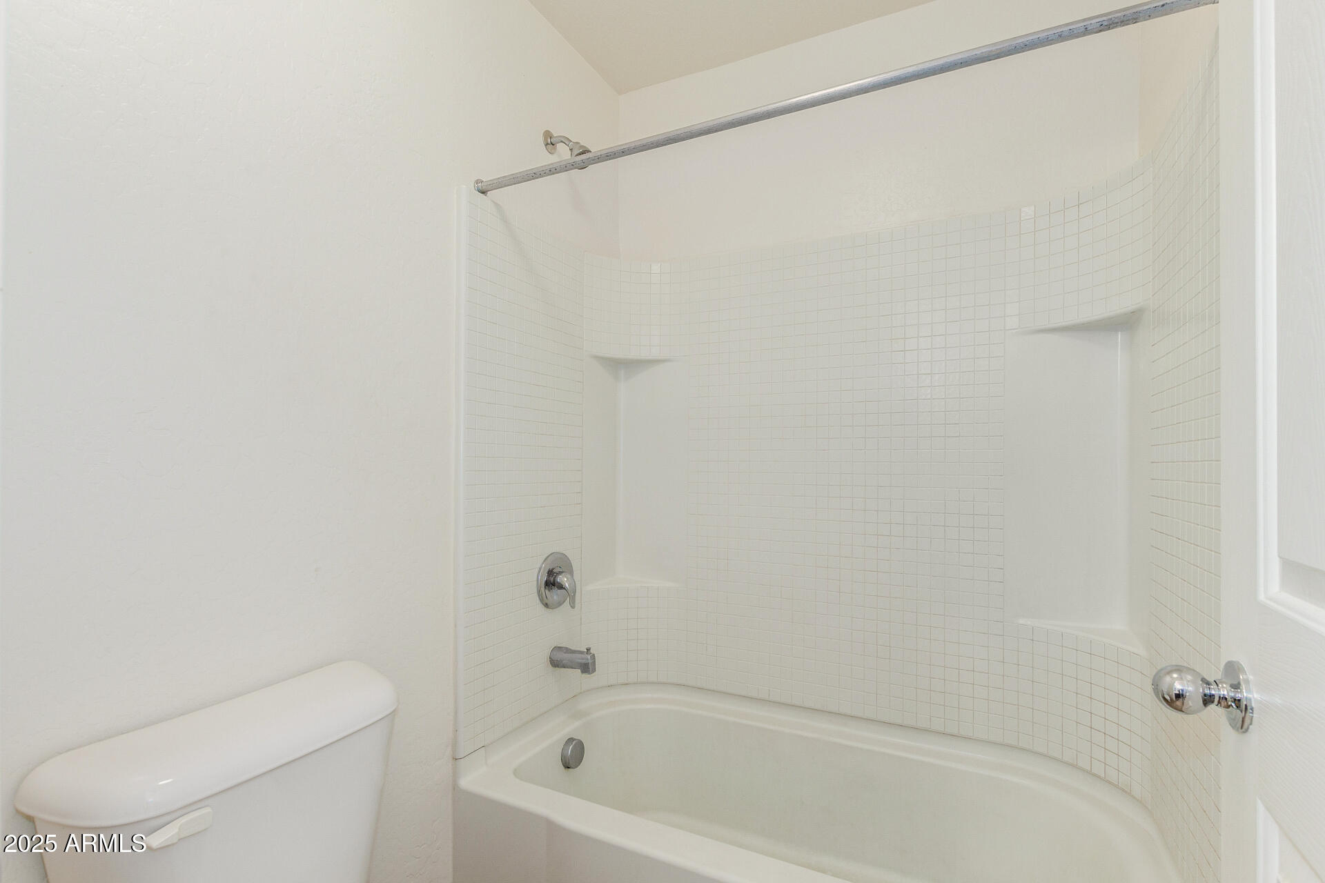 20932 Vía De Arboles Queen Creek, AZ 85142 - Photo 42 of 58 a bathroom with a bathtub and a toilet
