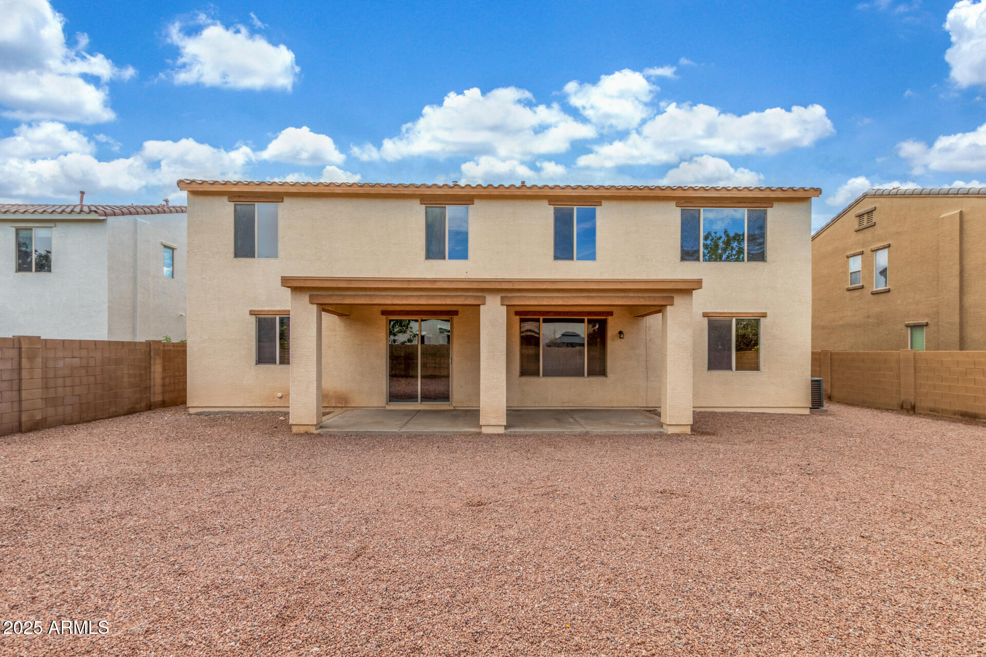 20932 Vía De Arboles Queen Creek, AZ 85142 - Photo 57 of 58 a view of house with yard and balcony