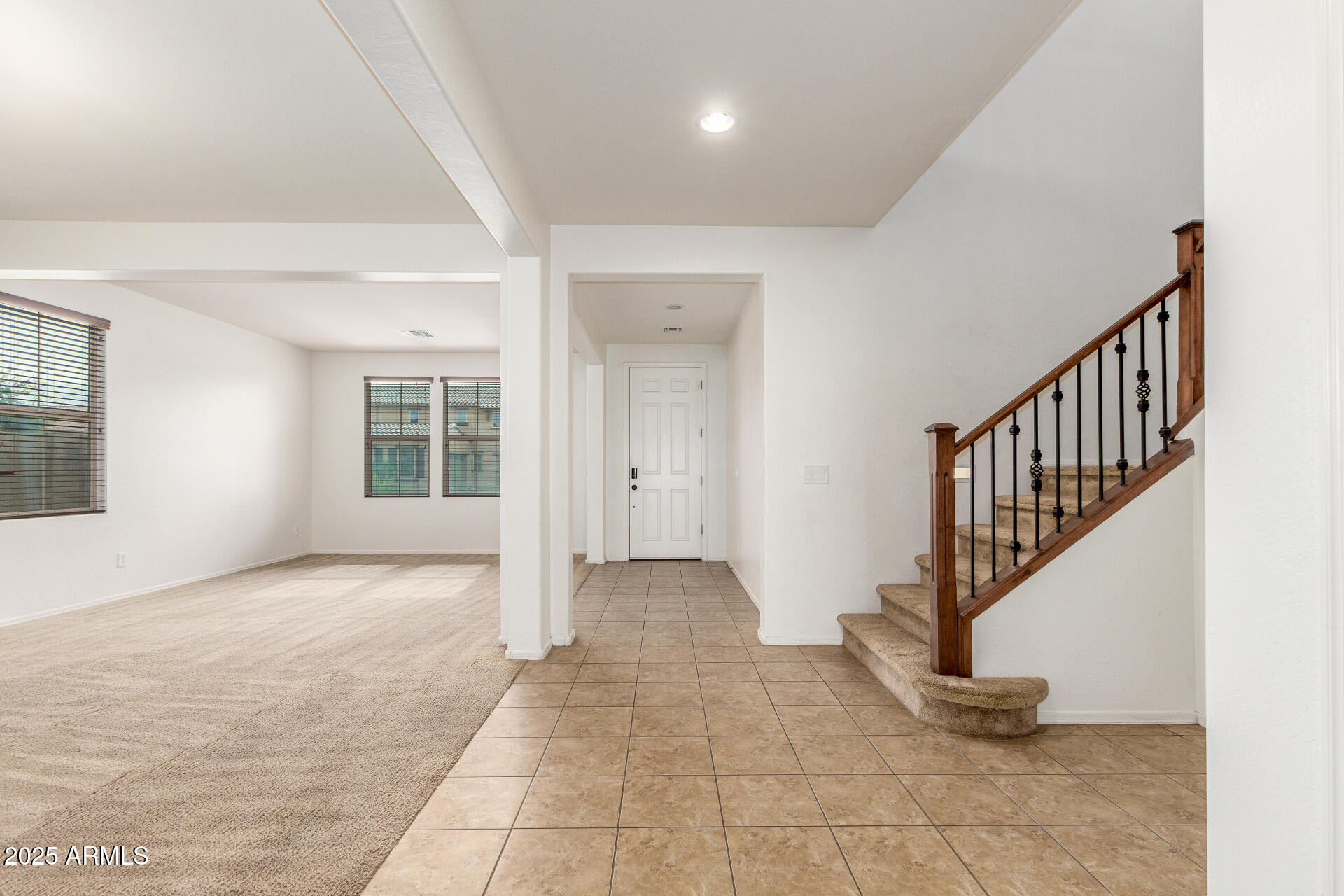 20932 Vía De Arboles Queen Creek, AZ 85142 - Photo 7 of 58 a view of an entryway with wooden floor