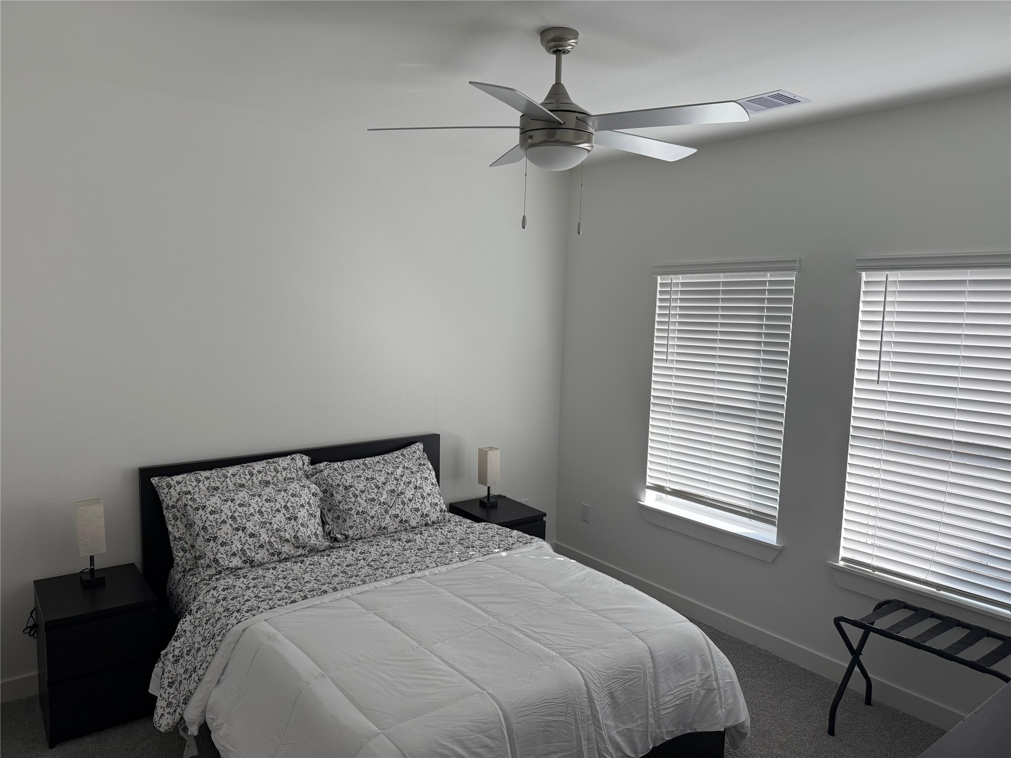 11621 Waldemar Drive Houston, TX 77077 - Photo 11 of 17 a bedroom with a bed and a window