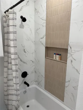 a bathroom with a bathtub