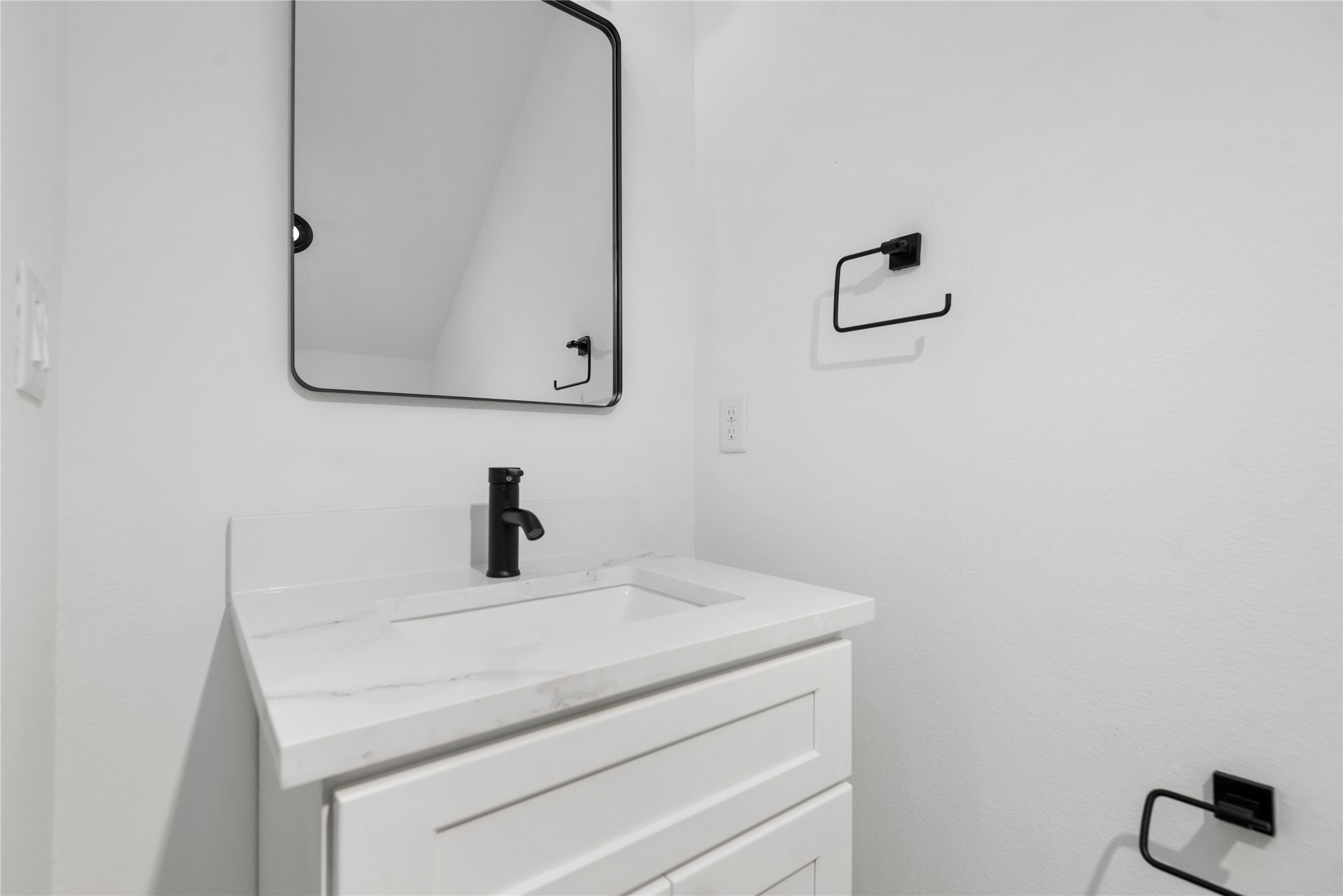 11621 Waldemar Drive Houston, TX 77077 - Photo 16 of 17 a bathroom with a sink and mirror