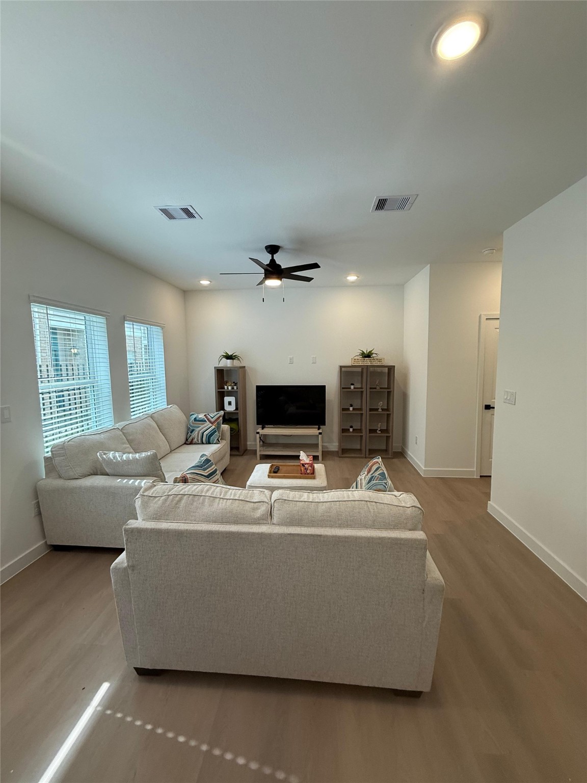 11621 Waldemar Drive Houston, TX 77077 - Photo 5 of 17 a living room with furniture and a flat screen tv