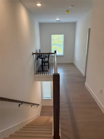 a view of kitchen with wooden floor